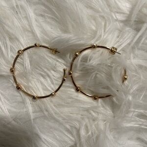 Coach earrings with clear stones and white pearly stones